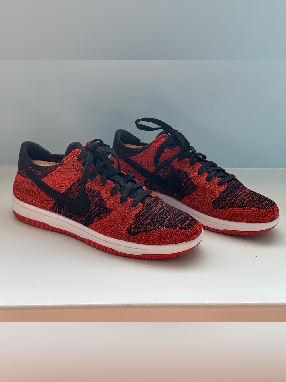 Nike Flyknit Dunk Low-Top Sneakers in Red and Black